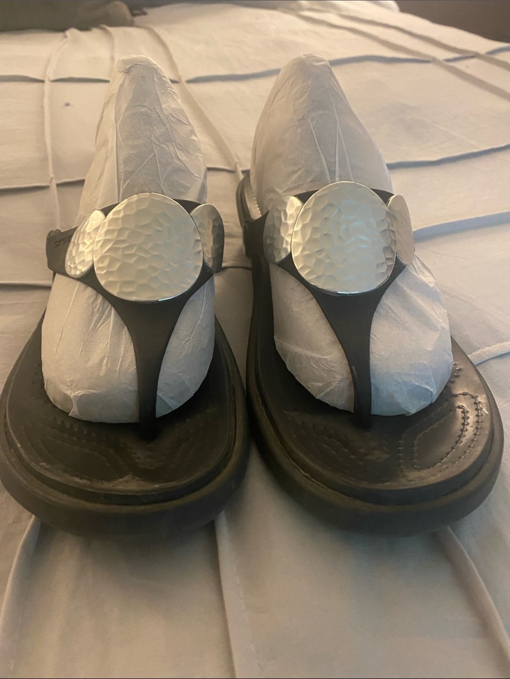 CROCS Black Thong Sandals with Silver Hammered Medallions